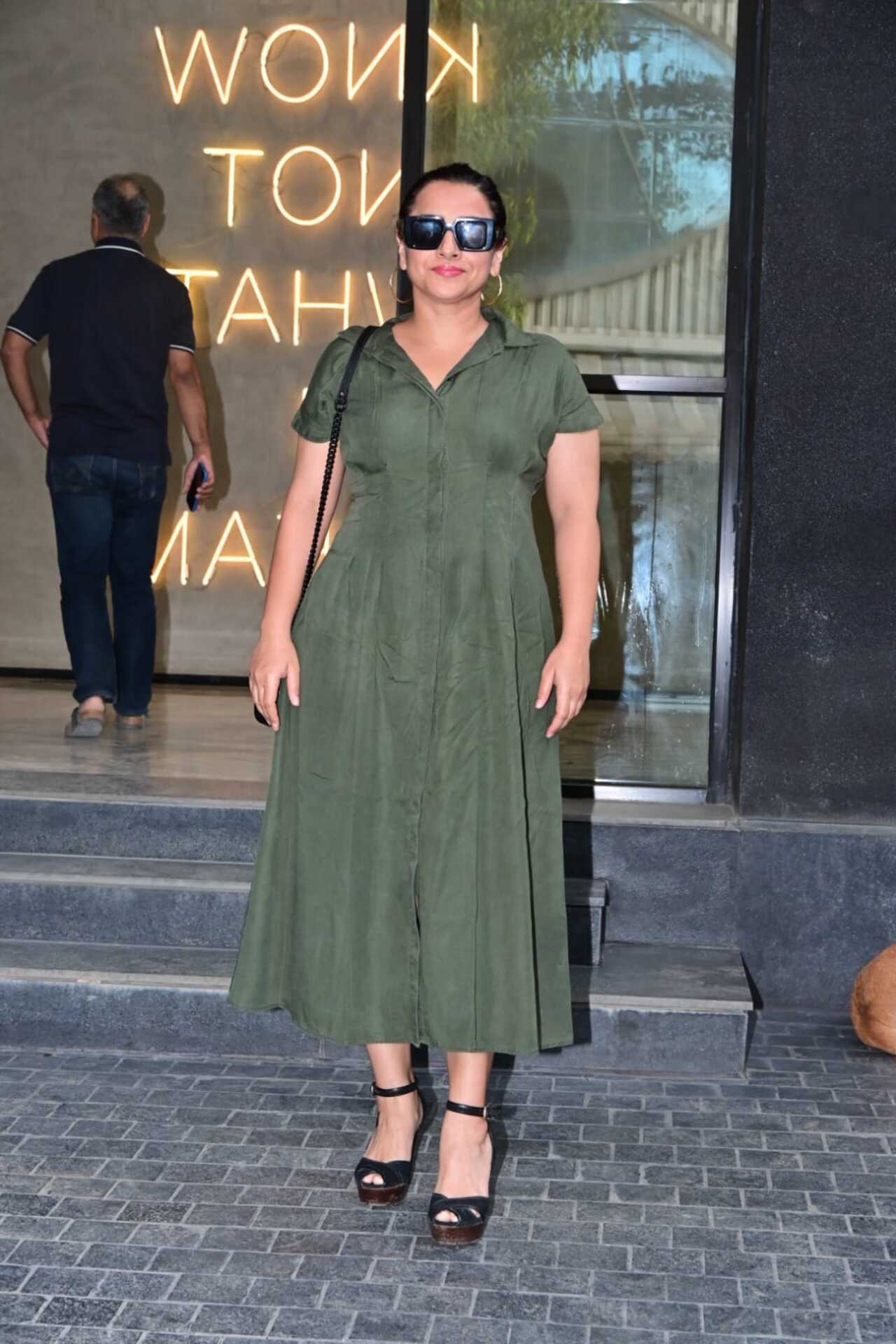 Vidya Balan opted for a chic and understated look in an olive-green midi dress.